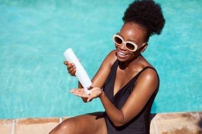 Historically, it was believed that melanin-rich skin did not require sun protection due to the natural protection it offers against the sun's rays (Image: Getty)